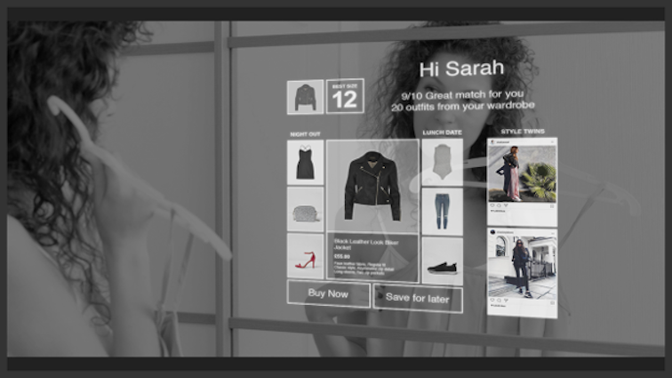 Image of a woman being recommended an outfit on a screen display