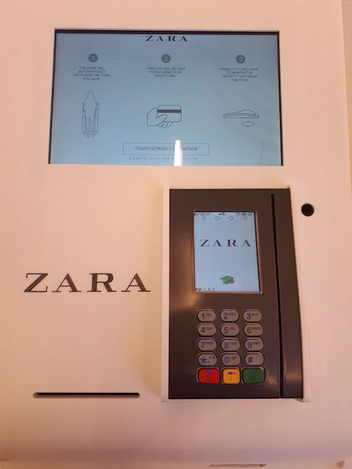 Close up image of the touchscreen interface of a self-service kiosk at a Zara store